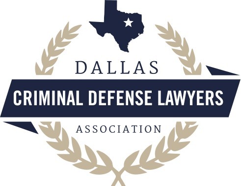 Logo of the Dallas Criminal Defense Lawyers Association, featuring a star on a Texas map and laurel wreath design.